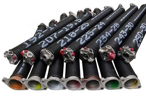 Torsion spring being installed above garage door